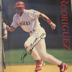 Signed Texas Rangers Baseball photo inside 1997 yearbook- White & Red Uniform